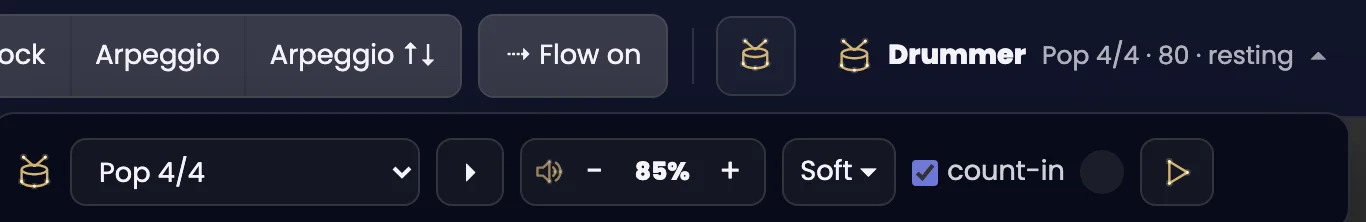 The 🥁 Drummer drawer open under the editor's playback bar, Starry Night theme. At the top, next to the Block, Arpeggio, Arpeggio ↑↓ strikes and the Flow on button: “Drummer — Pop 4/4 · 80 · resting”. In the drawer, on a single line: a dropdown showing “Pop 4/4”, a play button, a volume control “🔊 − 85% +”, a “Soft” menu, a ticked “count-in” box and a last play button.